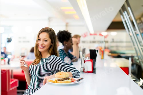 Preview: Young woman in the diner