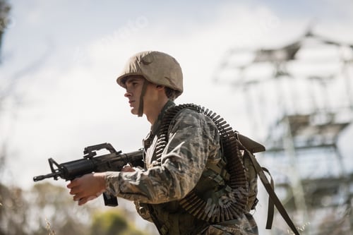Preview: Serious Young Man Training with Assault Rifle