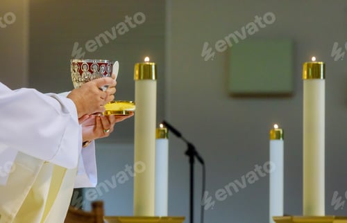 Preview: Holy communion cup of glass with red wine, bread and Holy Bible prayer for wine