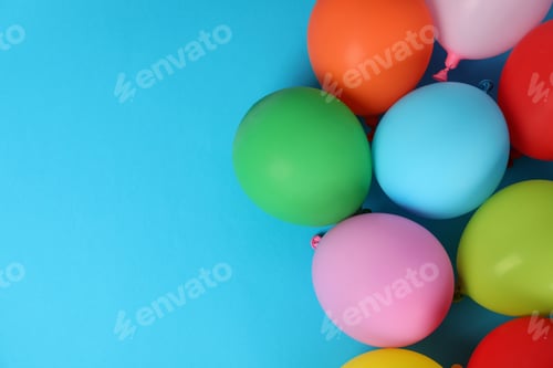 Preview: Multicolored balloons on blue background, space for text