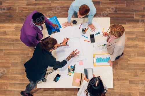 Preview: High angle of a multiracial business people having a meeting in an office