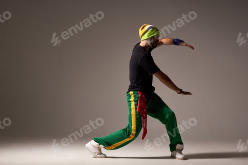 Preview: Sportive hiphopper performing on stage