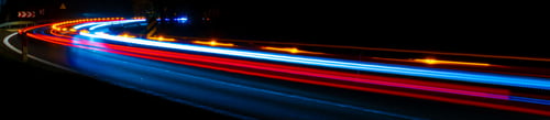 Preview: lights of moving cars at night. long exposure