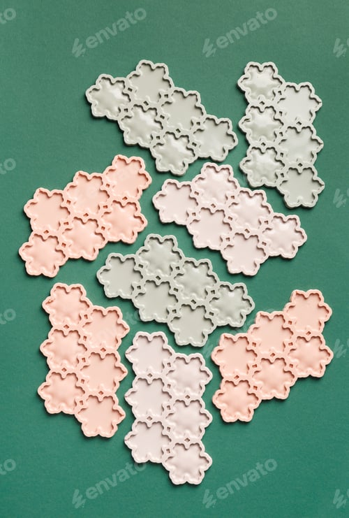 Preview: Silicone molds for making chocolate, lollipops, sweets on a green background, top view.