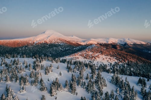 Preview: Winter aerial landscape of majestic Carpathian mountains. Background with sunset