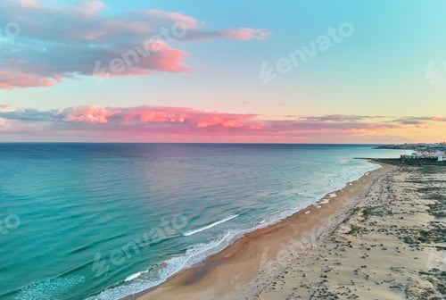 Preview: Mediterranean Sea under a colorful sky in La Mata, Torrevieja, Costa Blanca, Spain during sunset