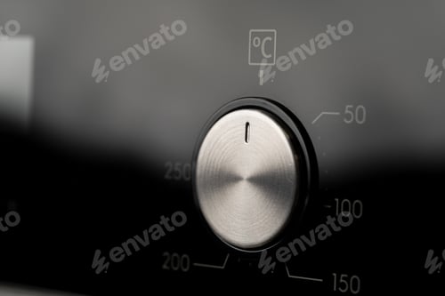 Preview: Modern oven mode control button close up