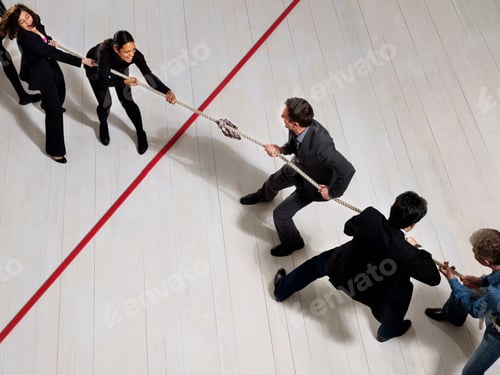Preview: Business people playing tug of war