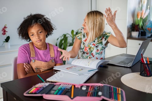 Preview: Frustrated mother having conflict with daughter during homework