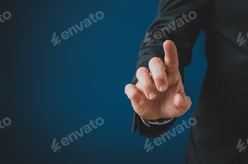 Preview: Businessman touching blank virtual screen with his finger