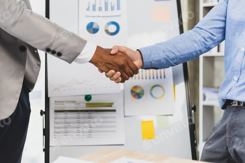 Preview: Meeting of business partners shaking hands in the office.