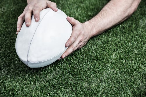 Preview: Rugby player scoring a try on astro turf grass