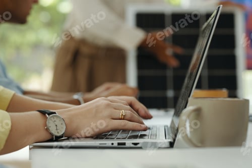 Preview: Woman Typing On Laptop At Presentation