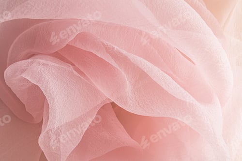 Preview: delicate texture of pink fabric. Elegant transparent silk surface. A copy of the space.