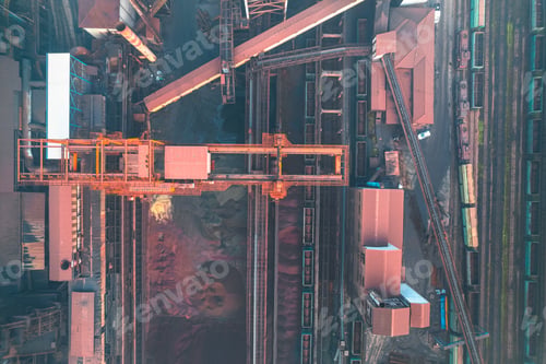 Preview: Industrial iron production factory during manifacture, aerial view from exterior,among smokes