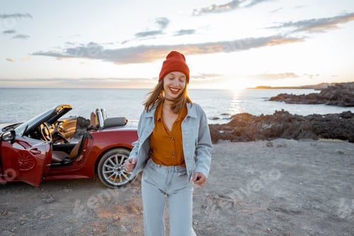 Preview: Woman traveling by car on the rocky coastline