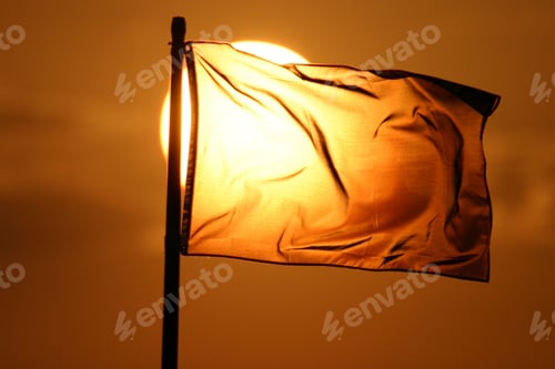 Preview: Clear flag waving against a golden sunset background