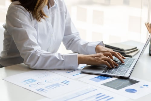 Preview: Business woman working in finance and accounting Analyze financial budget in the office.