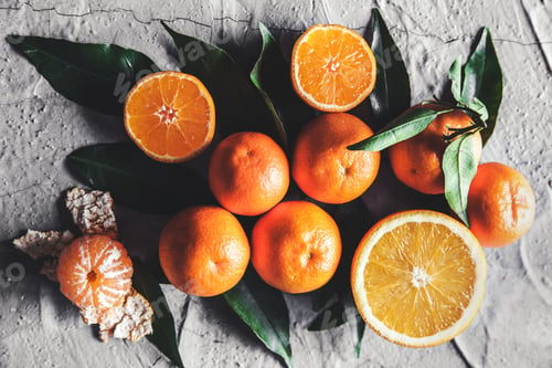 Preview: Citrus on table: mandarin, tangerine with a knife. Fresh organic juicy fruits