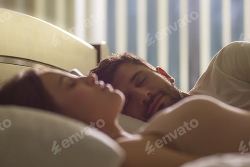 Preview: The handsome man sleeping near the woman in the bed