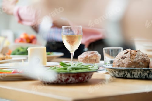 Preview: A working lunch, a salad buffet, with people behind.
