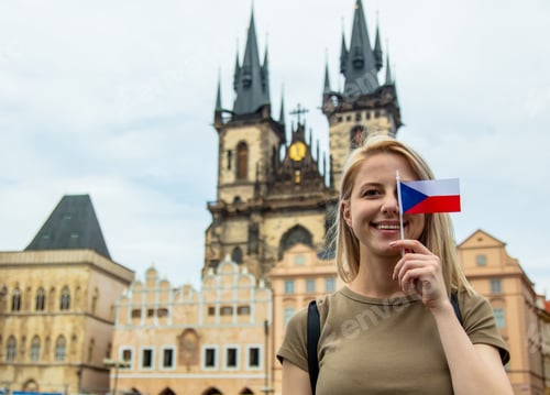Preview: Blonde woman with a flag at central square in Prague, Czech Republic