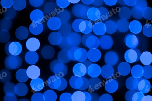 Preview: Unfocused abstract colourful bokeh black background. defocused and blurred many round blue light