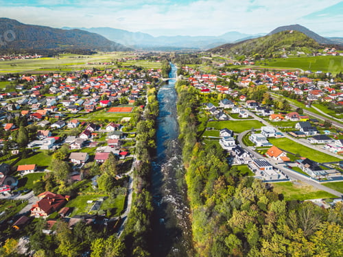 Preview: Suburban community divided in half by the river running straight trough
