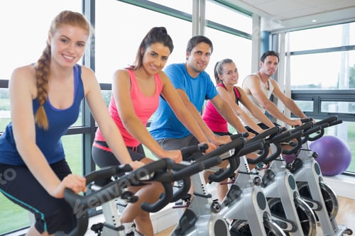 Preview: Portrait Of Five People Working Out At An Exercise Bike Class In Gym