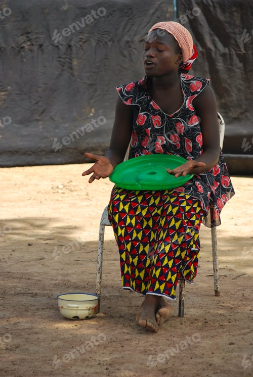 Preview: Scene of an african social theater play to raise awareness over forced mariage - market sell is