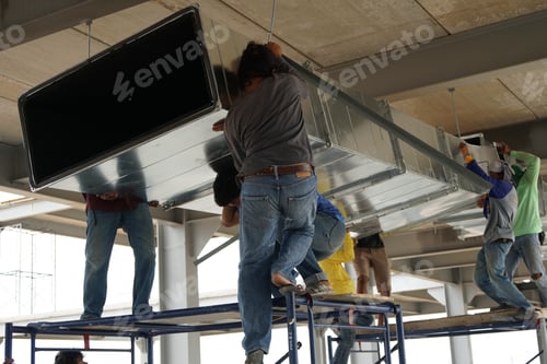 Preview: Workers are helping to raise the cool air duct of the air conditioning system to install