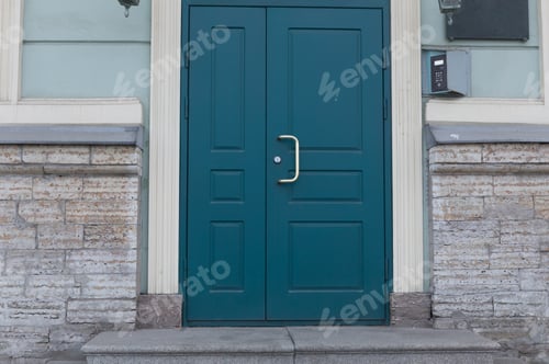 Preview: Old vintage green door. Abstract exterior and interior around the entrance. Doors of city houses.