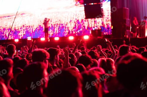 Preview: crowd partying stage lights live concert summer music festival