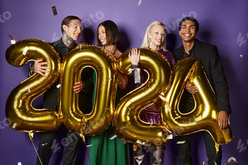 Preview: New Year party, joyous interracial friends in suits and dresses holding balloons with numbers 2024