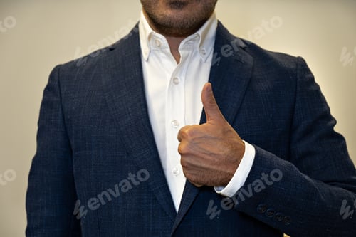 Preview: cropped portrait businessman,fashion. man in white shirt and suit thumbs up