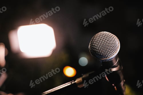 Preview: Closeup shot of a microphone on the stage