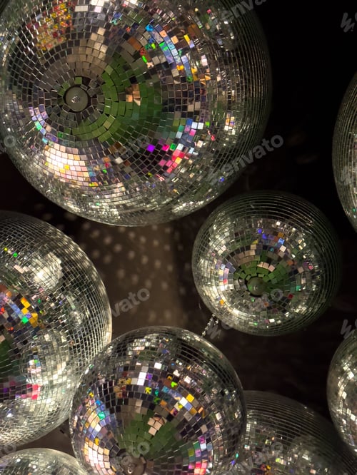 Preview: Vibrant closeup of colorful disco balls.