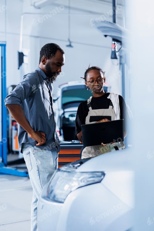 Preview: Technician calculates car cleaning costs