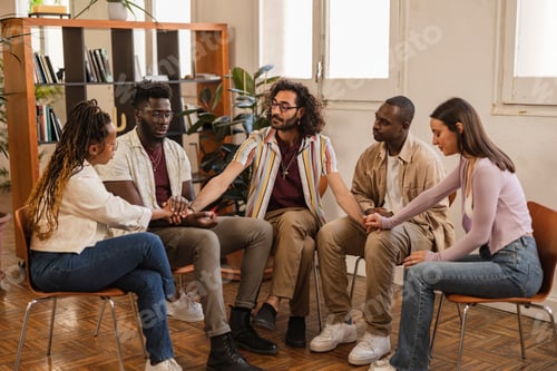 Preview: seminar talk therapy group of people sitting - diverse multiracial people talking in a group therapy