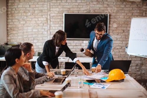 Preview: Business meeting of construction engineers in the office