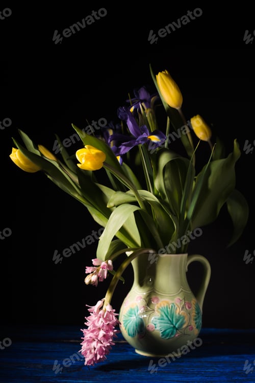 Preview: Bouquet of flowers in a ceramic jug side view