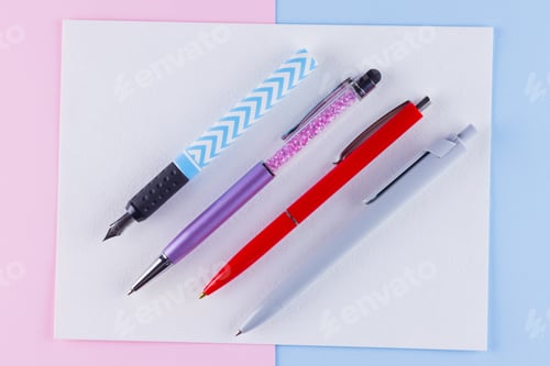 Preview: Back To School Pop Art Concept. School Stationery On Pink Blue Background. Multicolored Pens On