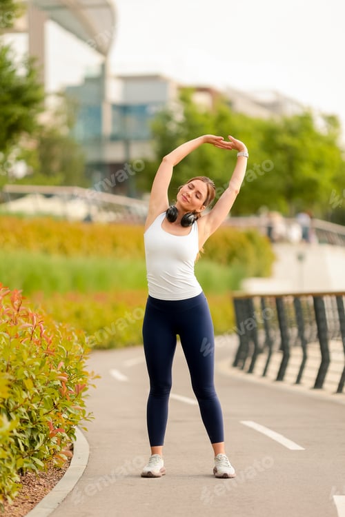 Preview: Stretching under the sun brings joy and wellness in a vibrant urban park during a bright afternoon