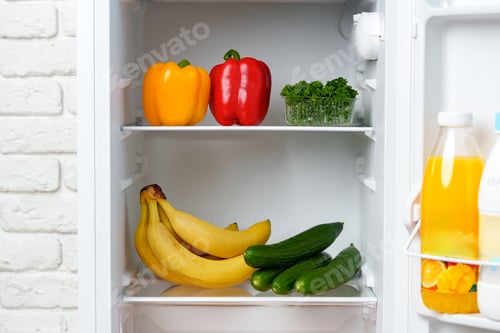 Preview: Open Refrigerator With Fresh Produce and Juice
