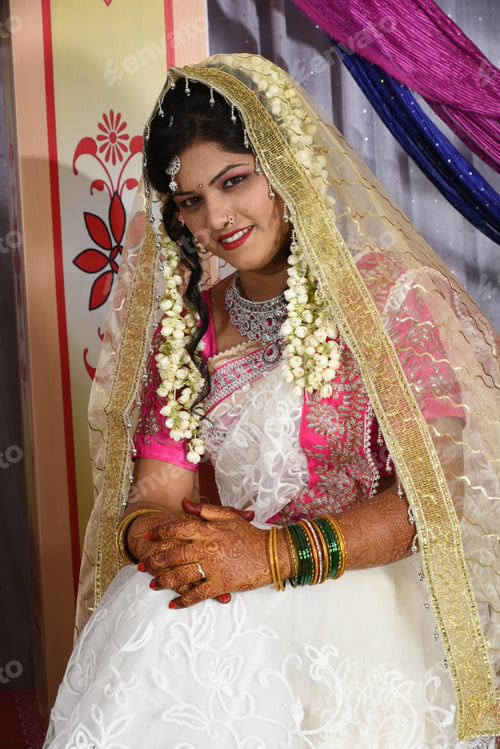 Preview: Indian bride wearing traditional wedding cloths in marriage ceremony.