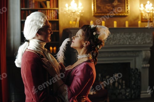 Preview: Middle Aged Caucasian Couple Wearing Baroque Costumes Gazing at Each Other