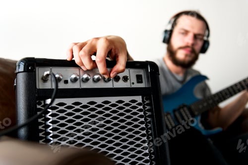 Preview: Caucasian man praticing electric guitar
