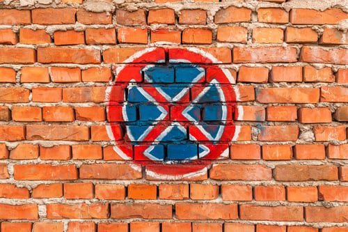 Preview: No stopping and no parking sign on old worn wall