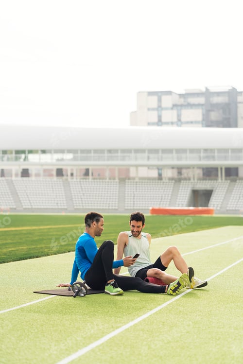 Preview: Athletes using phone in Athletic Track