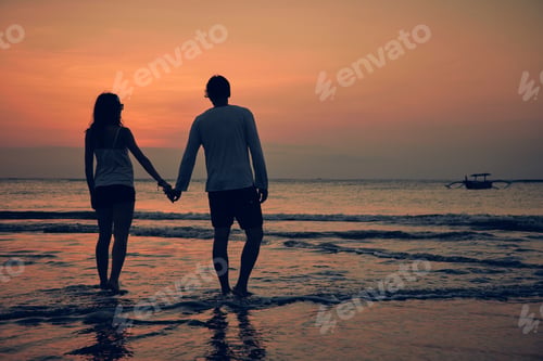 Preview: Silhouette Of A Girl In Sunset / Sunrise Time Over The Ocean.